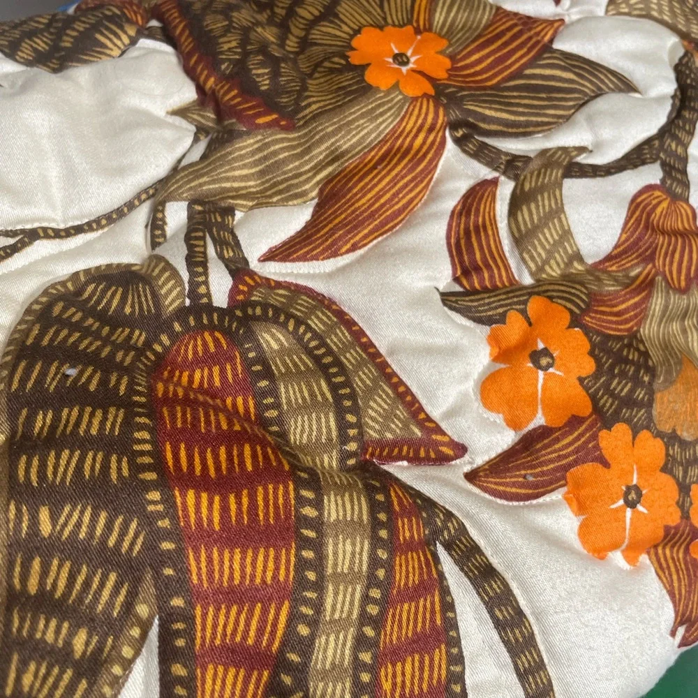1960’s Floral Comforter - Orange, brown and mustard colors.